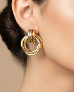 Load image into Gallery viewer, In Your Power Earrings - Dual-tone intertwined gold earrings. Anti-tarnish &amp; lightweight for everyday empowerment.
